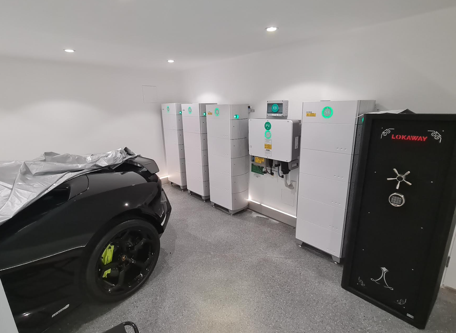 Premium battery storage bank installed in a garage